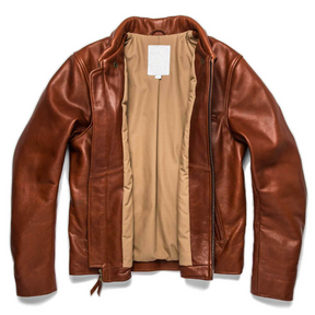 Open view of a brown leather rider jacket showing inner lining.