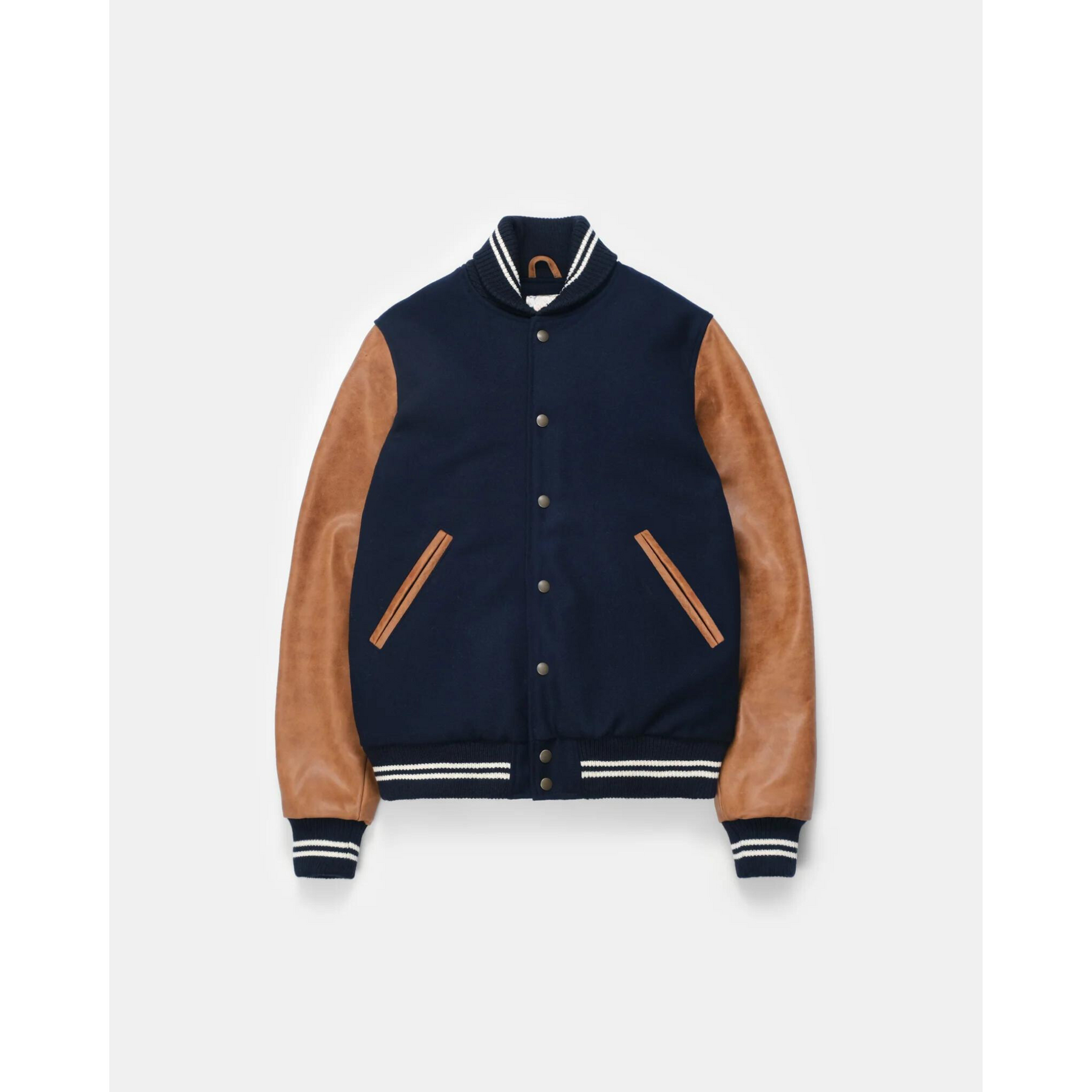 Navy varsity jacket front view with leather sleeves