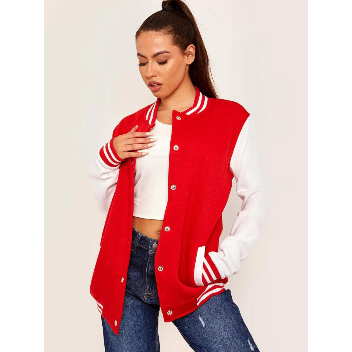 Women's red varsity jacket, stylish pose showing the button details